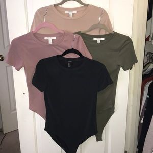 Lot of 4 women’s T-shirt body suits size small